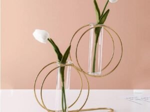 Golden iron vase with glass tube