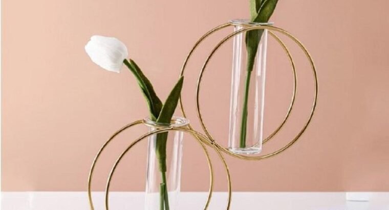 Golden iron vase with glass tube